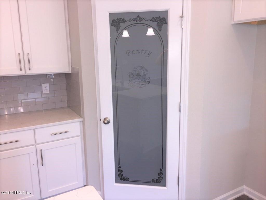 443 Deer Crossing Road St. Augustine, FL 32086 - Photo 32 of 47 PANTRY ETCHED DOOR