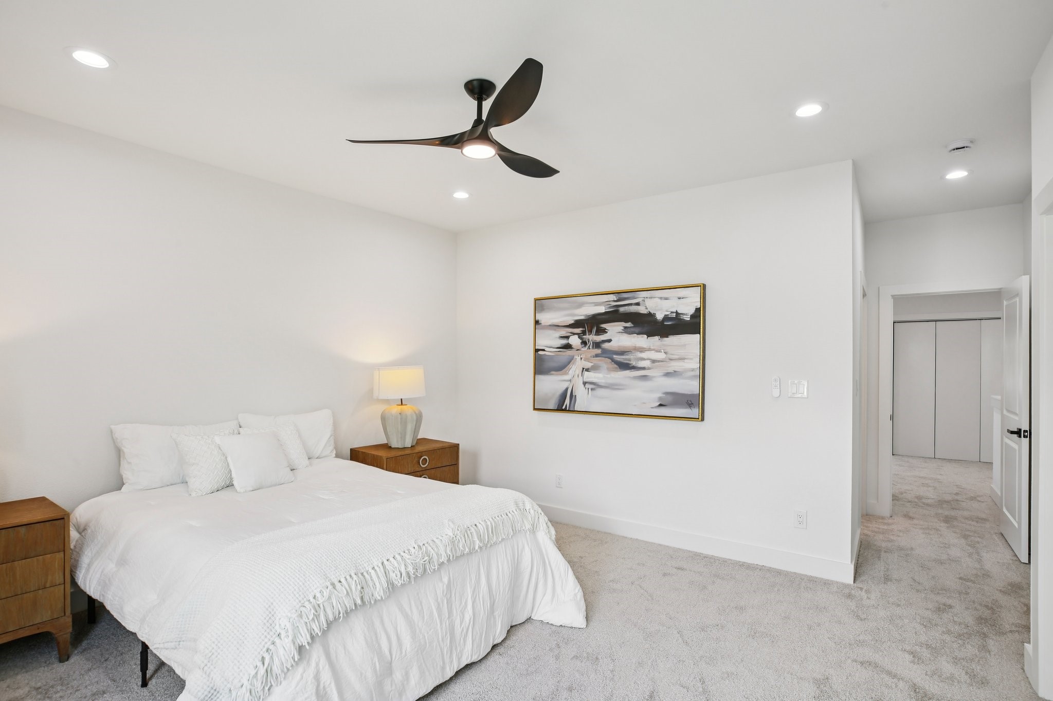 6739 Liverpool Street Houston, TX 77021 - Photo 24 of 27 a bedroom with a bed and a painting