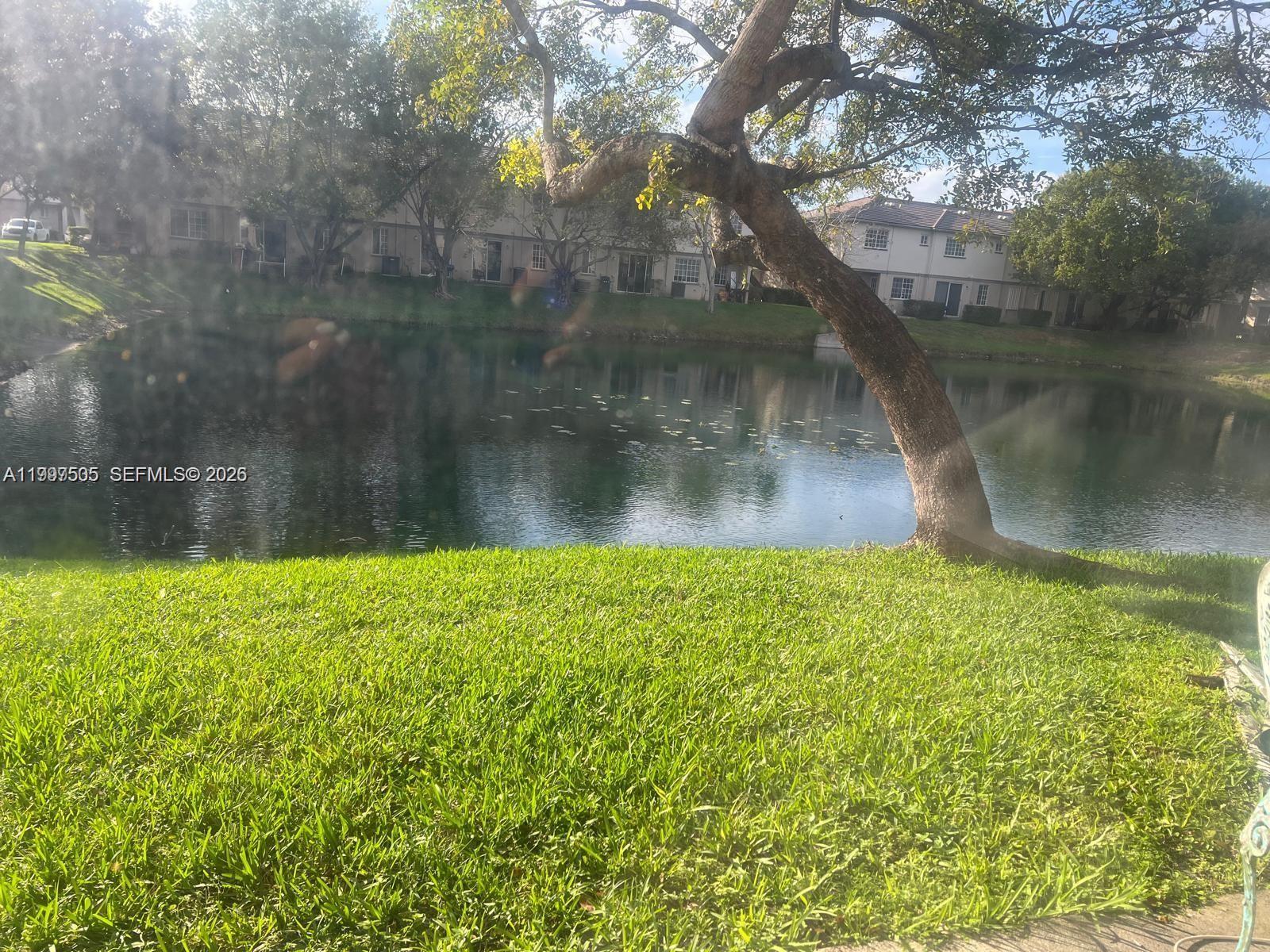 969 Abaco Lane Riviera Beach, FL 33404 - Photo 11 of 11 a view of a lake view