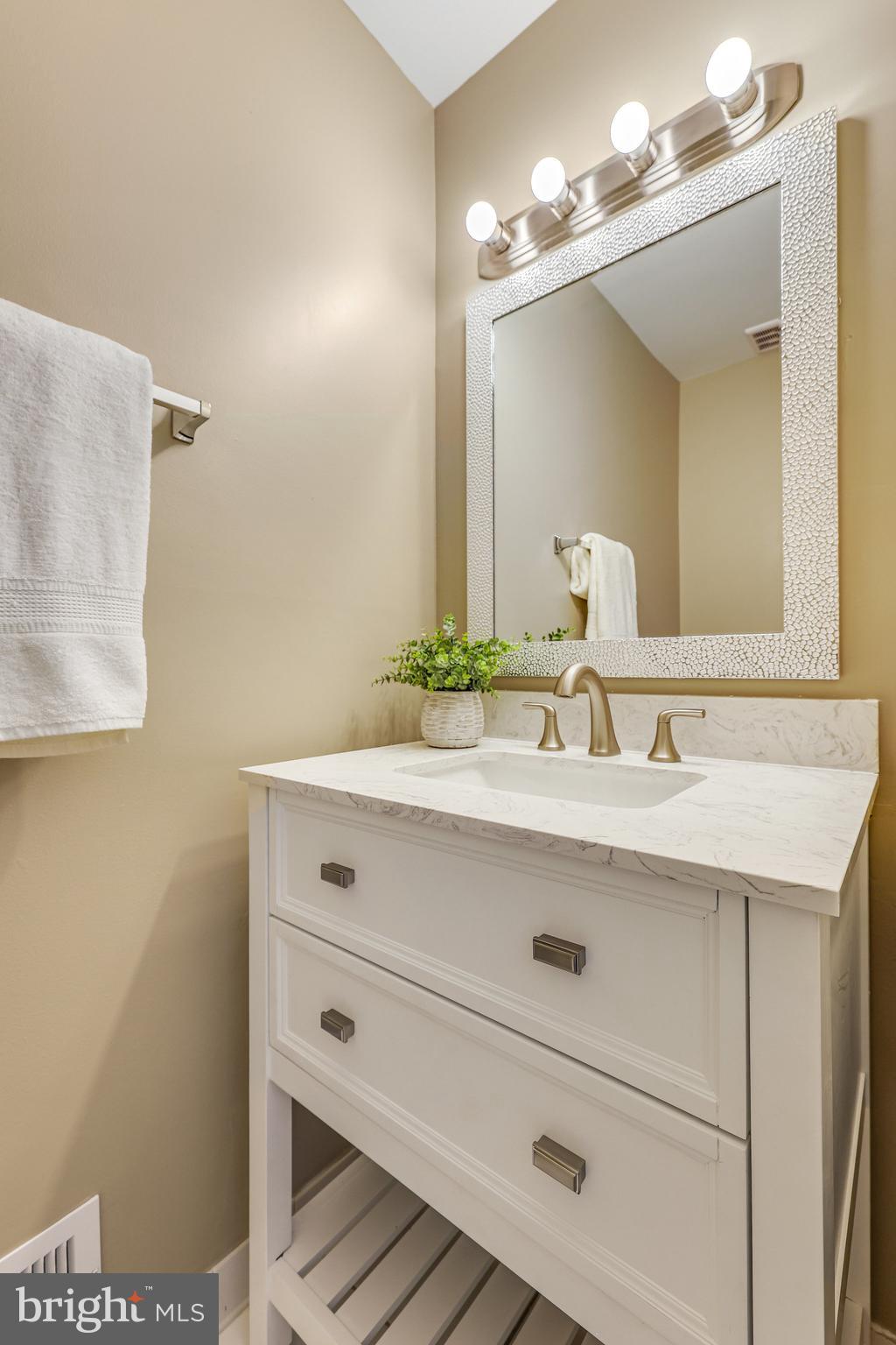 13426 Elevation Lane Herndon, VA 20171 - Photo 32 of 79 half bath on main floor