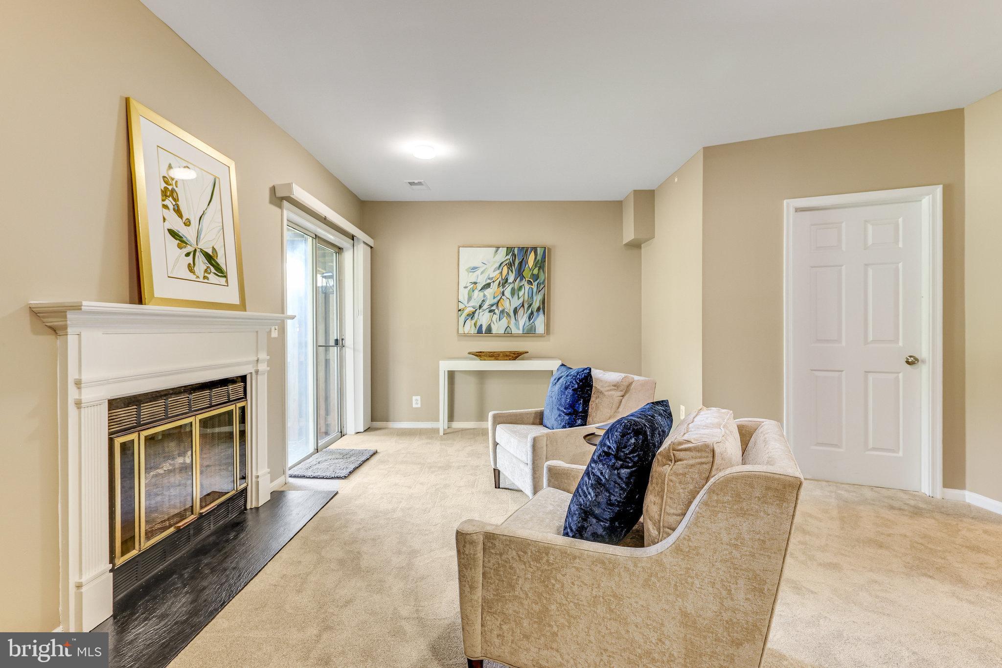 13426 Elevation Lane Herndon, VA 20171 - Photo 49 of 79 basement with fireplace and walk out