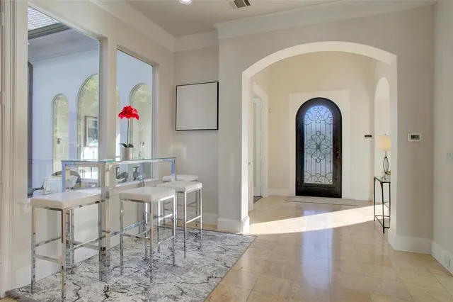 a view of livingroom with furniture and mirror