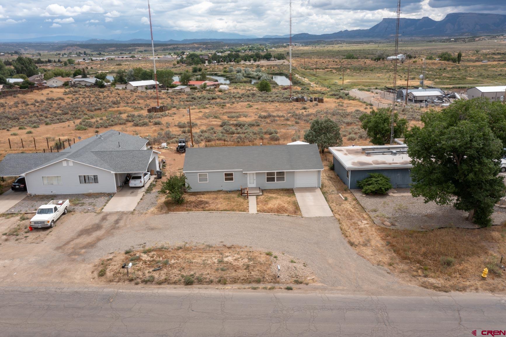 4 North Dolores Road Cortez, CO 81321 - Photo 11 of 24 an aerial view of residential houses with outdoor space