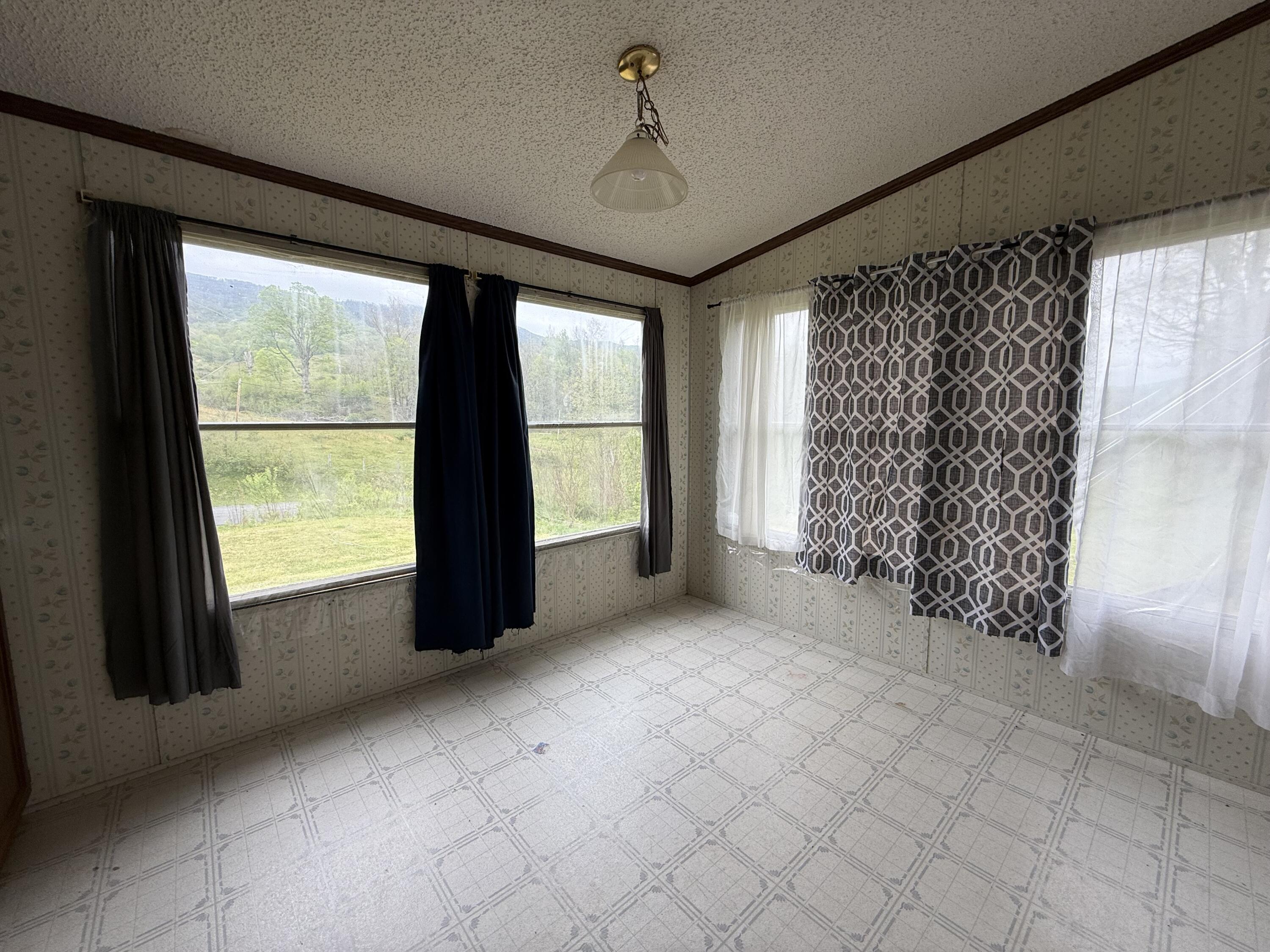 2468 Vly Ctr Road Monterey, VA 24465 - Photo 15 of 28 a view of an empty room with a window