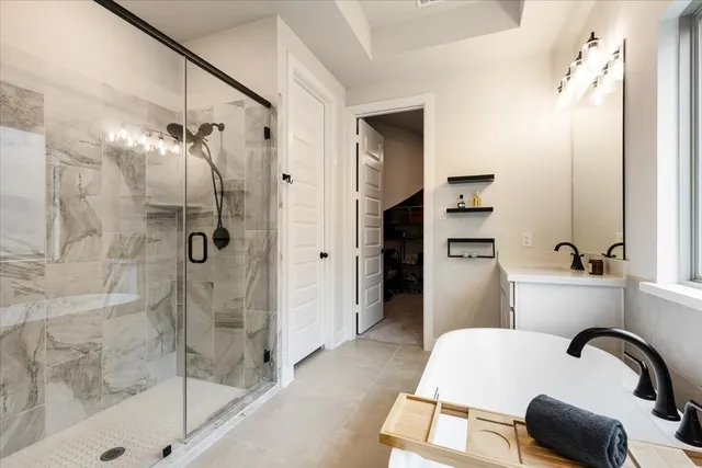 a bathroom with a sink and a shower