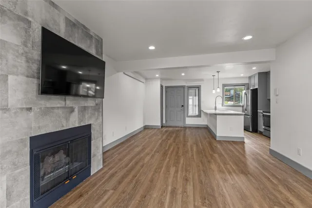 a view of a kitchen cabinets and a fireplace