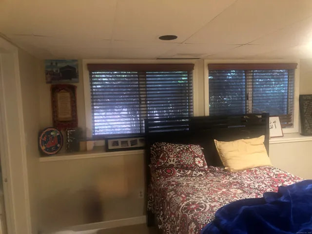 a view of a livingroom with furniture and windows