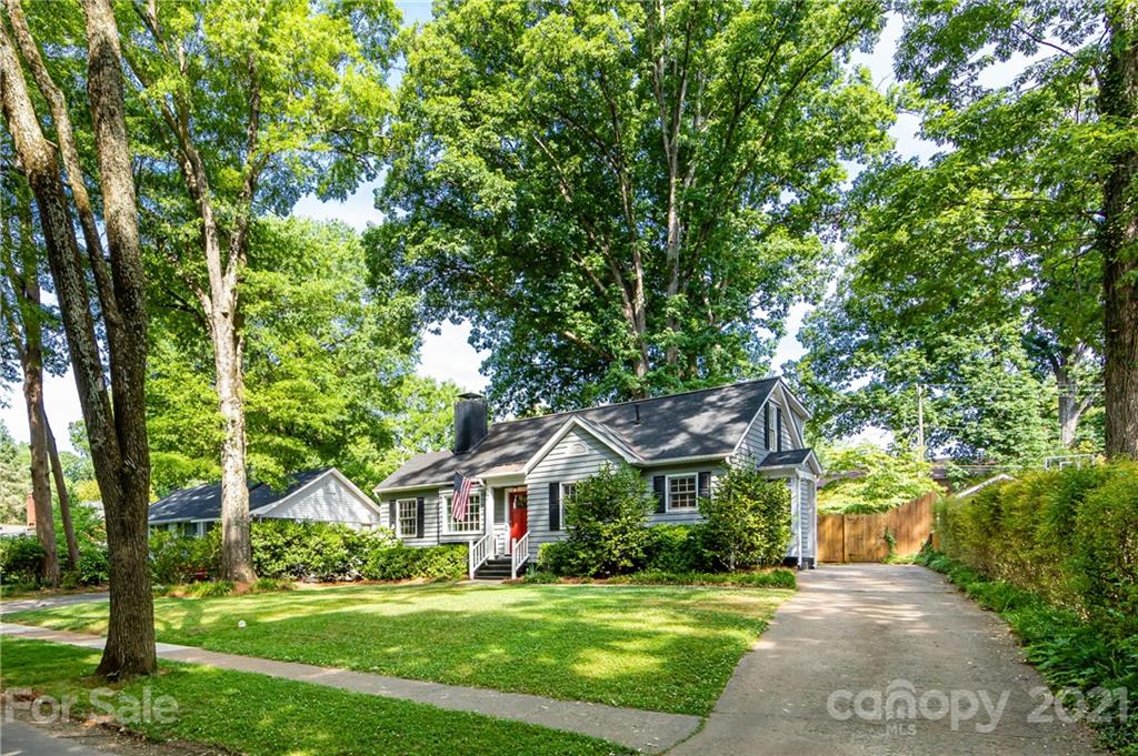816 Sedgefield Road Charlotte, NC 28209 - Photo 2 of 29 a front view of a house with a yard and trees
