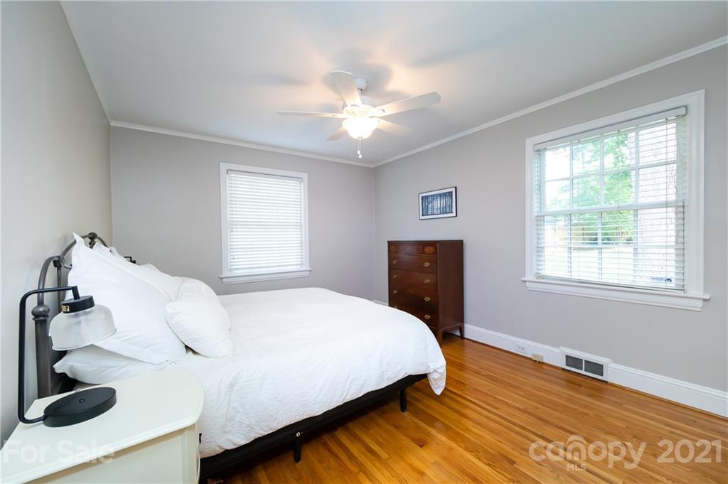 816 Sedgefield Road Charlotte, NC 28209 - Photo 20 of 29 a bedroom with a bed and window