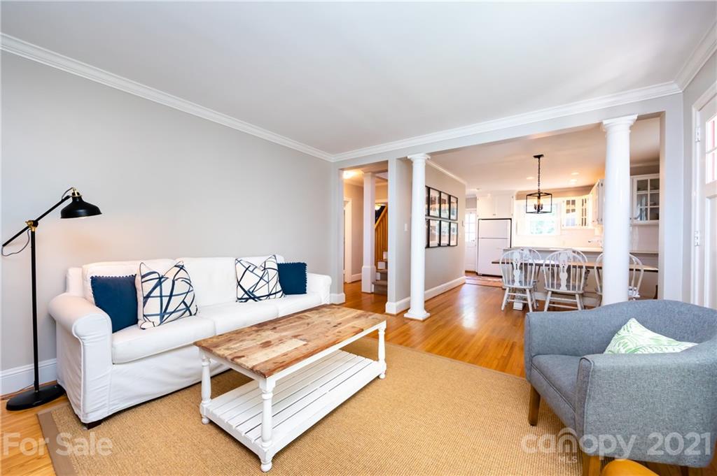 816 Sedgefield Road Charlotte, NC 28209 - Photo 6 of 29 a living room with furniture and a large window