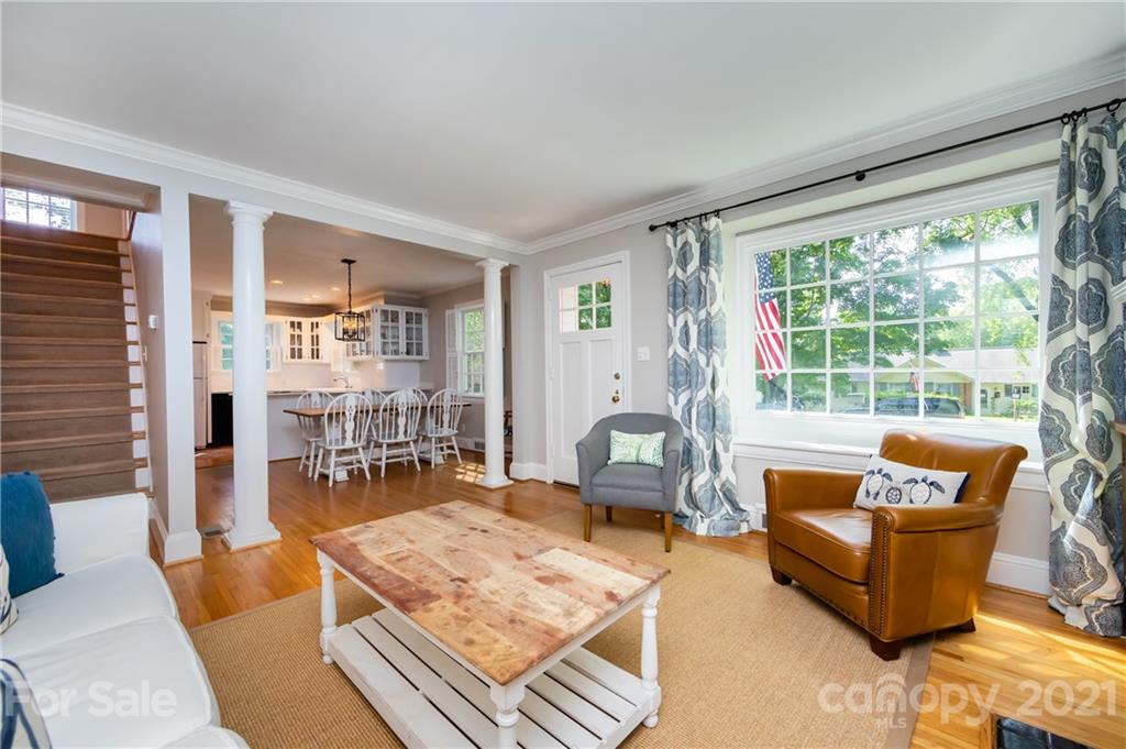 816 Sedgefield Road Charlotte, NC 28209 - Photo 7 of 29 a living room with furniture and a large window