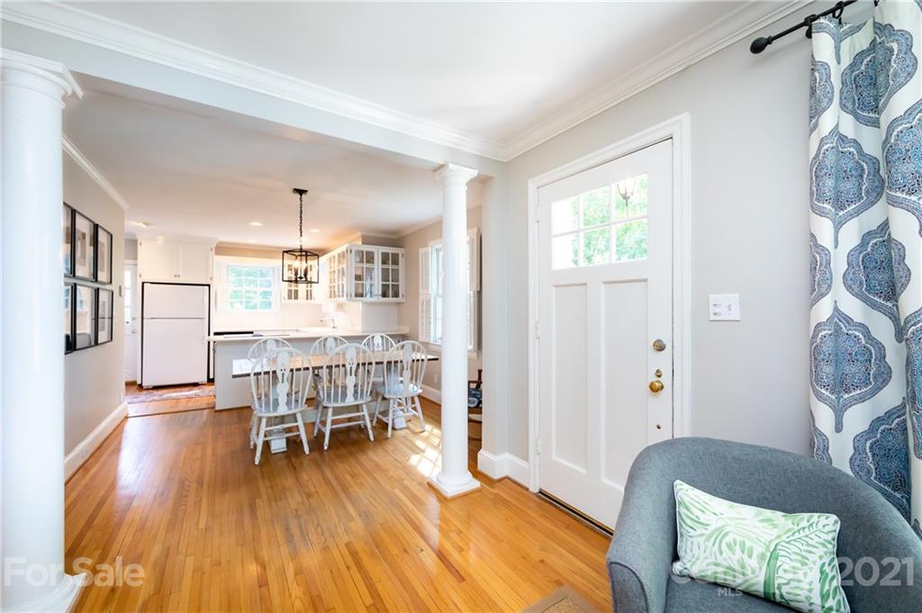816 Sedgefield Road Charlotte, NC 28209 - Photo 8 of 29 a living room with furniture and a wooden floor