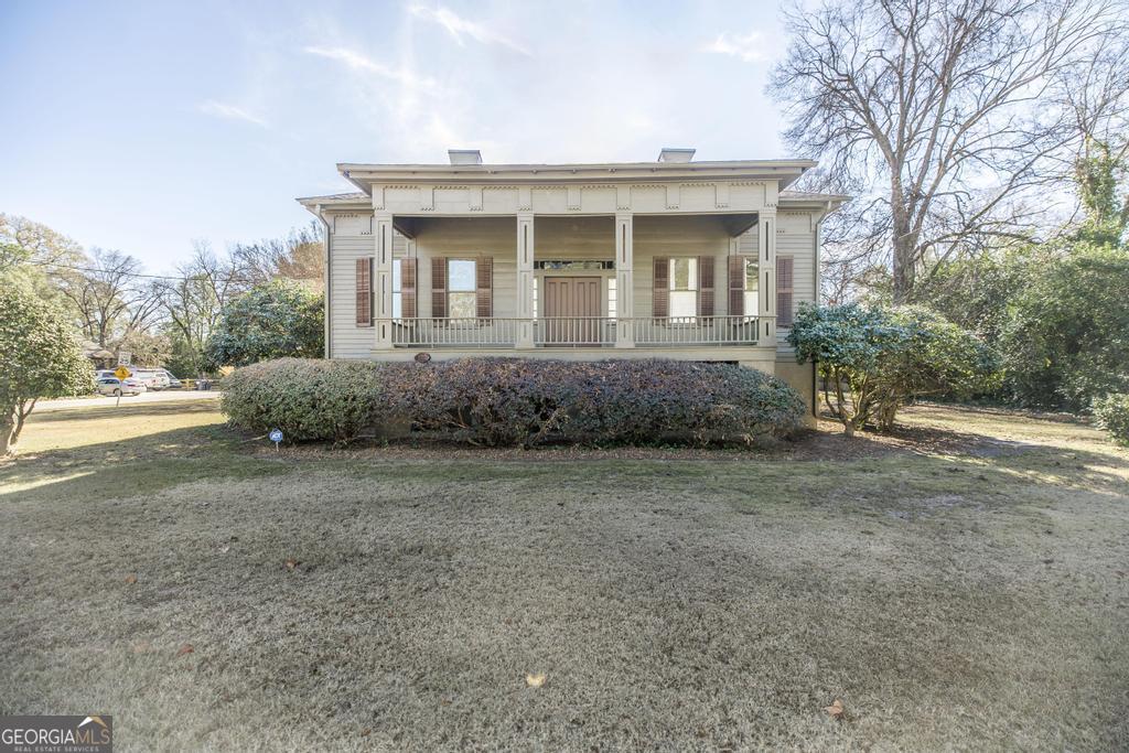 1212 Swift Street Perry, GA 31069 - Photo 1 of 1 a view of a house with a yard