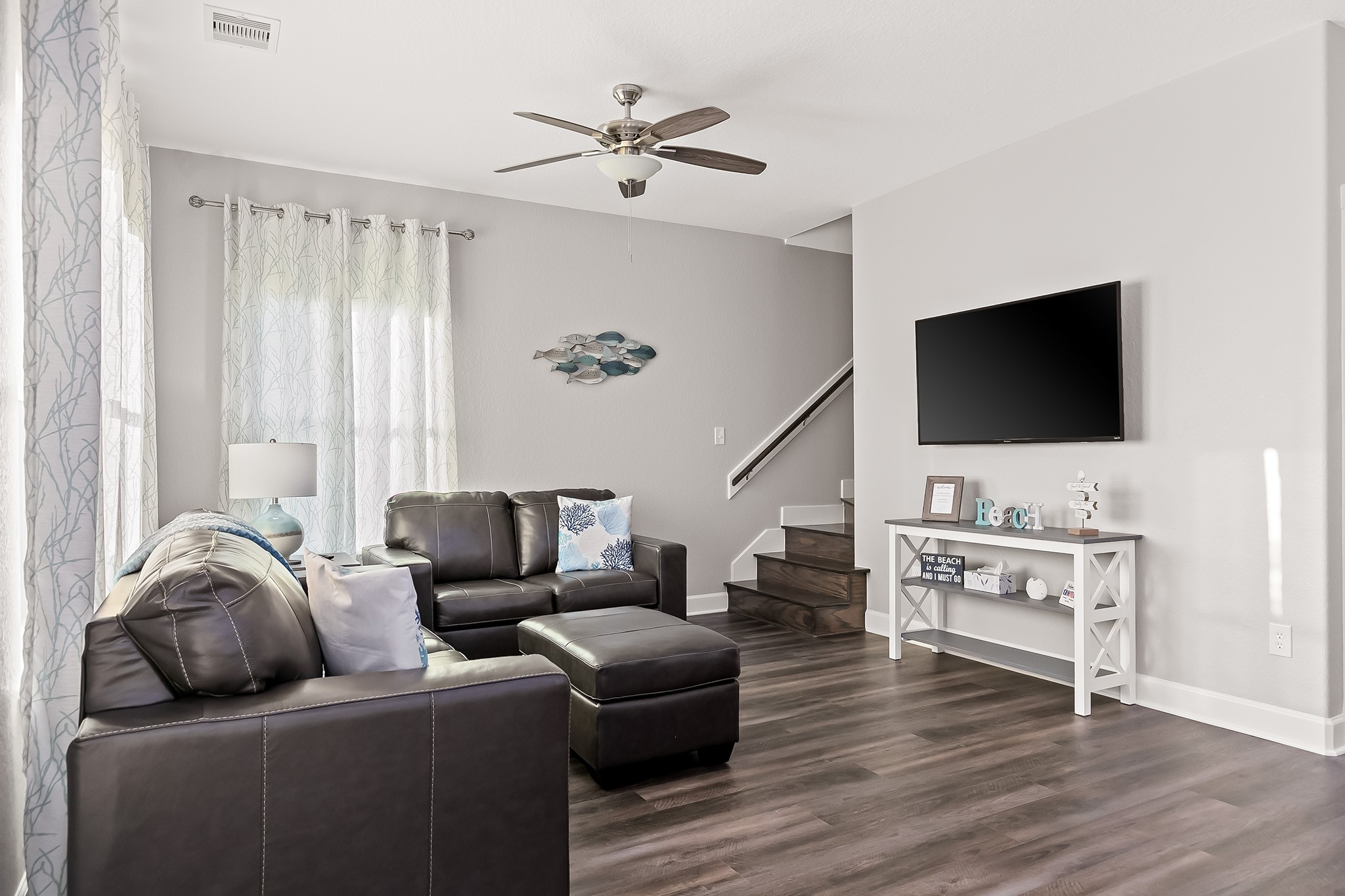106 Pelican Place Surfside Beach, TX 77541 - Photo 14 of 46 a living room with furniture and a flat screen tv