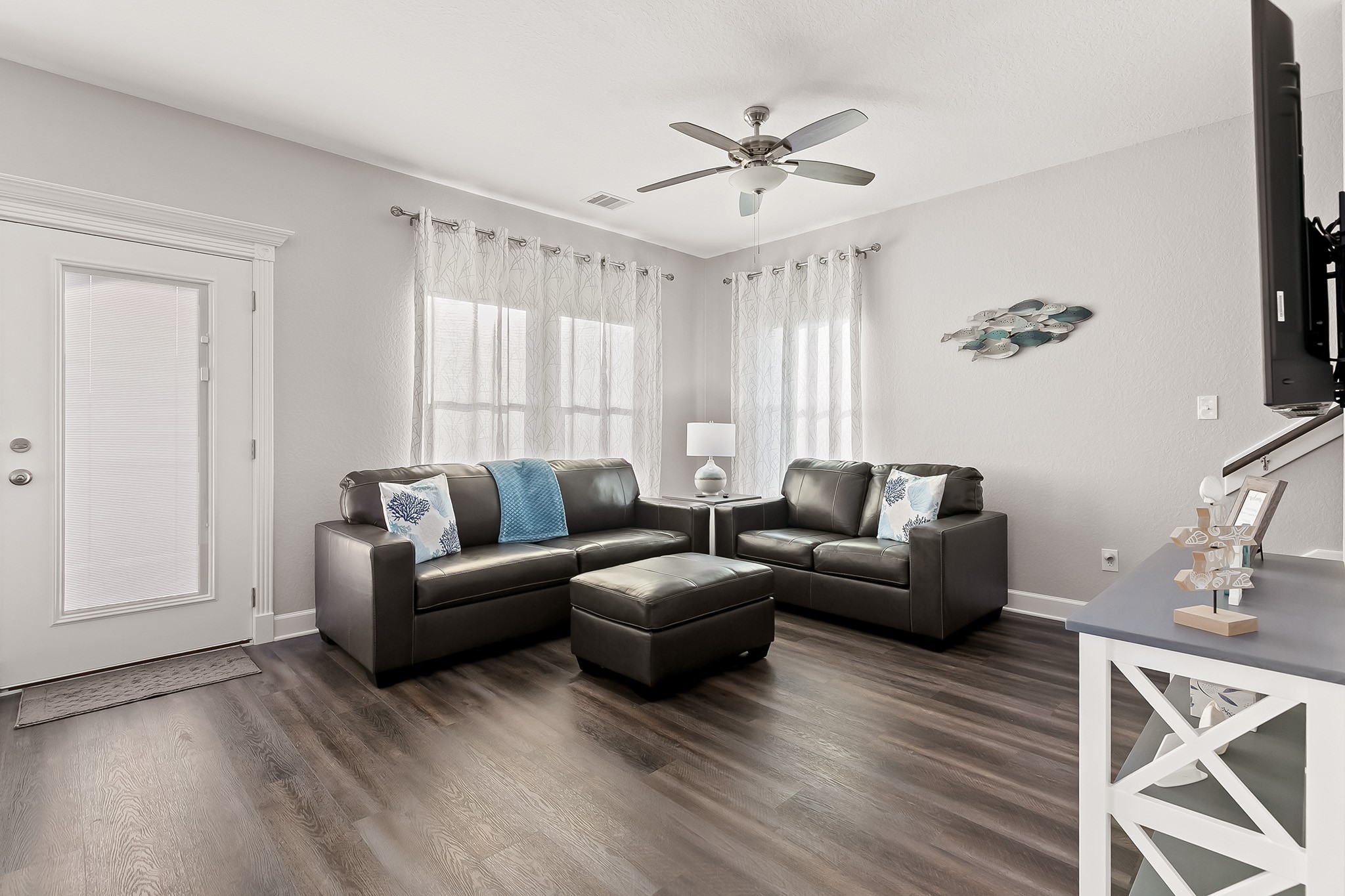 106 Pelican Place Surfside Beach, TX 77541 - Photo 15 of 46 a living room with furniture and a wooden floor
