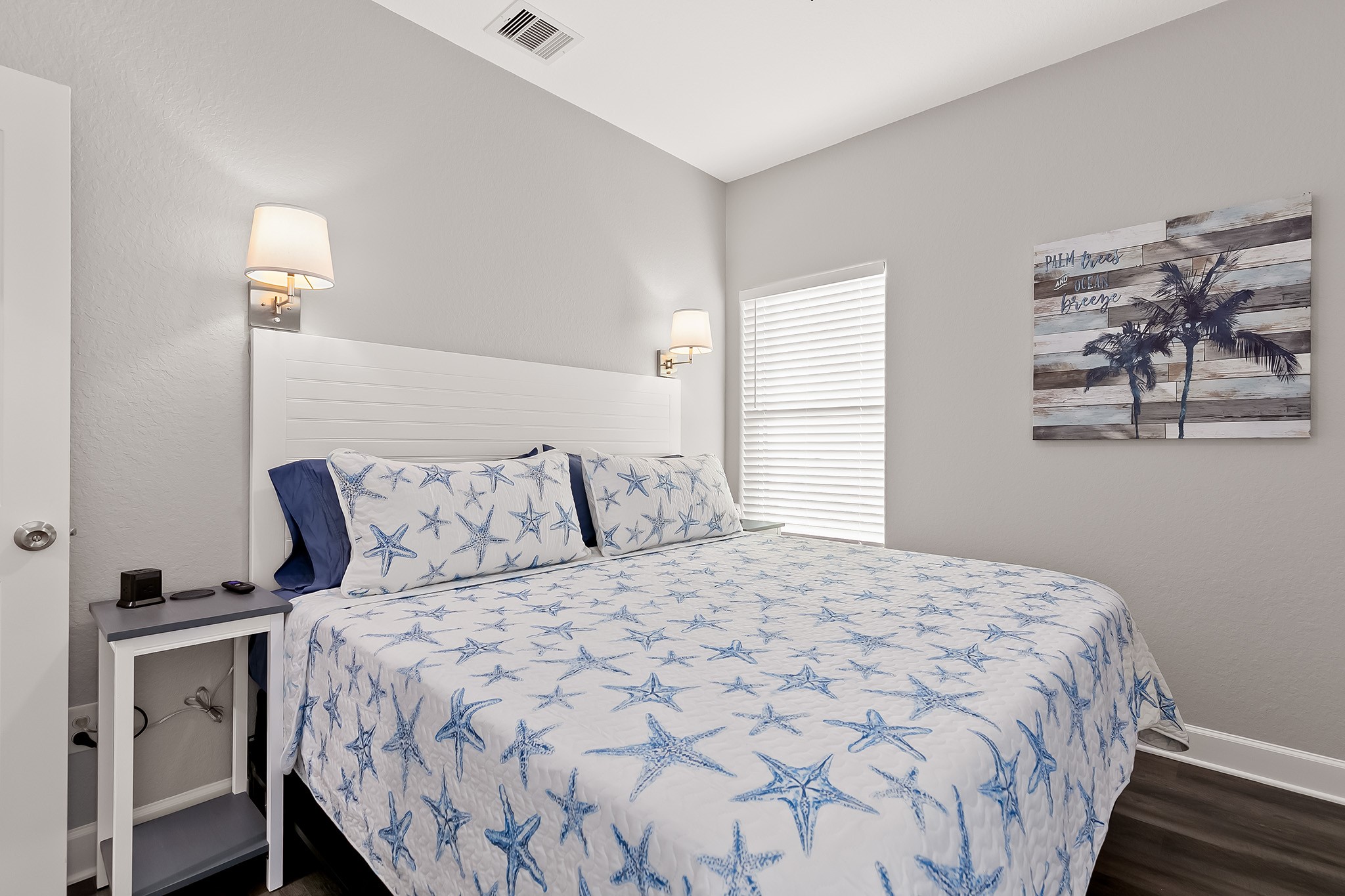 106 Pelican Place Surfside Beach, TX 77541 - Photo 16 of 46 a bedroom with a bed and a night stand