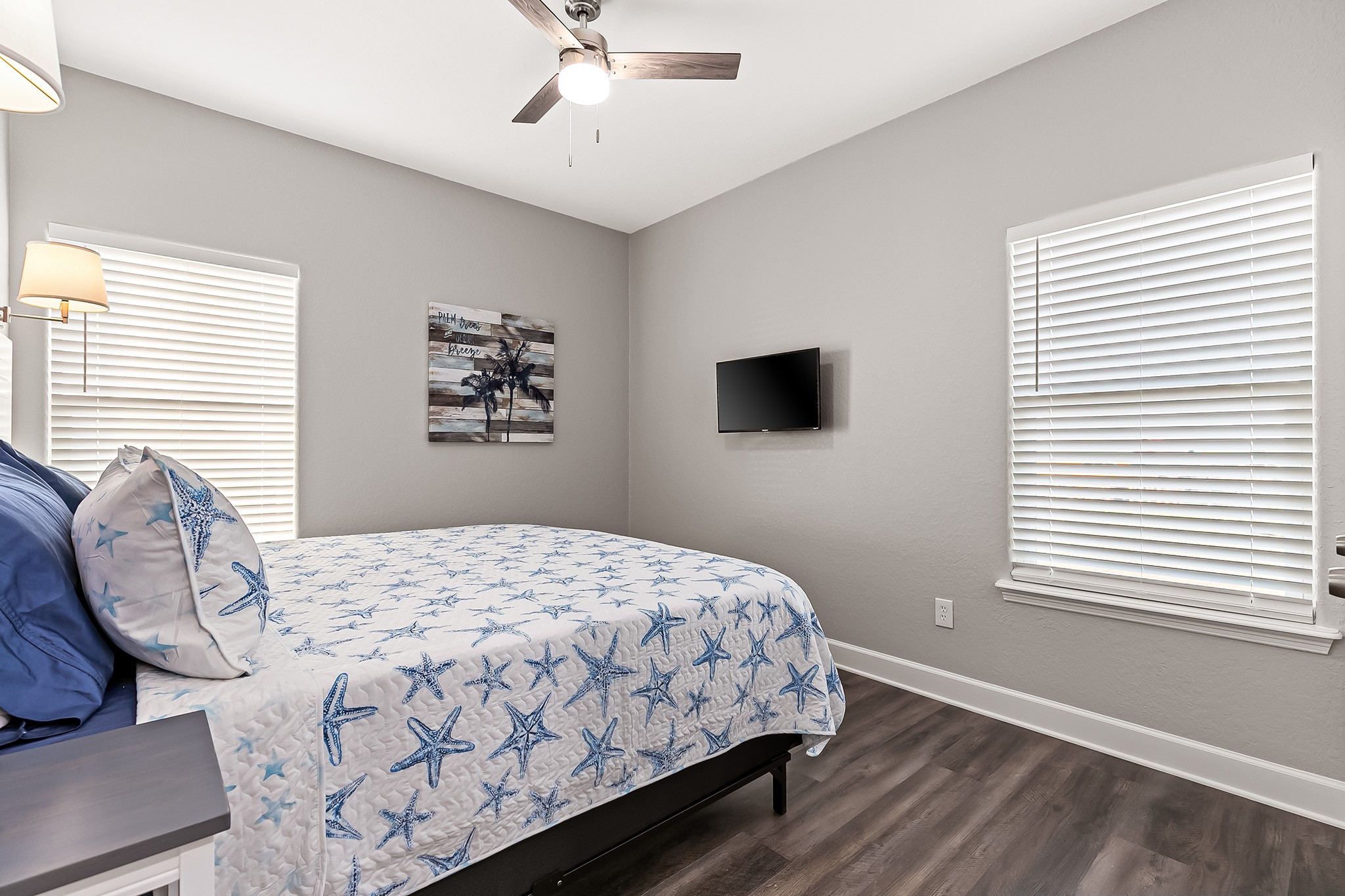 106 Pelican Place Surfside Beach, TX 77541 - Photo 17 of 46 a bedroom with a bed and a window