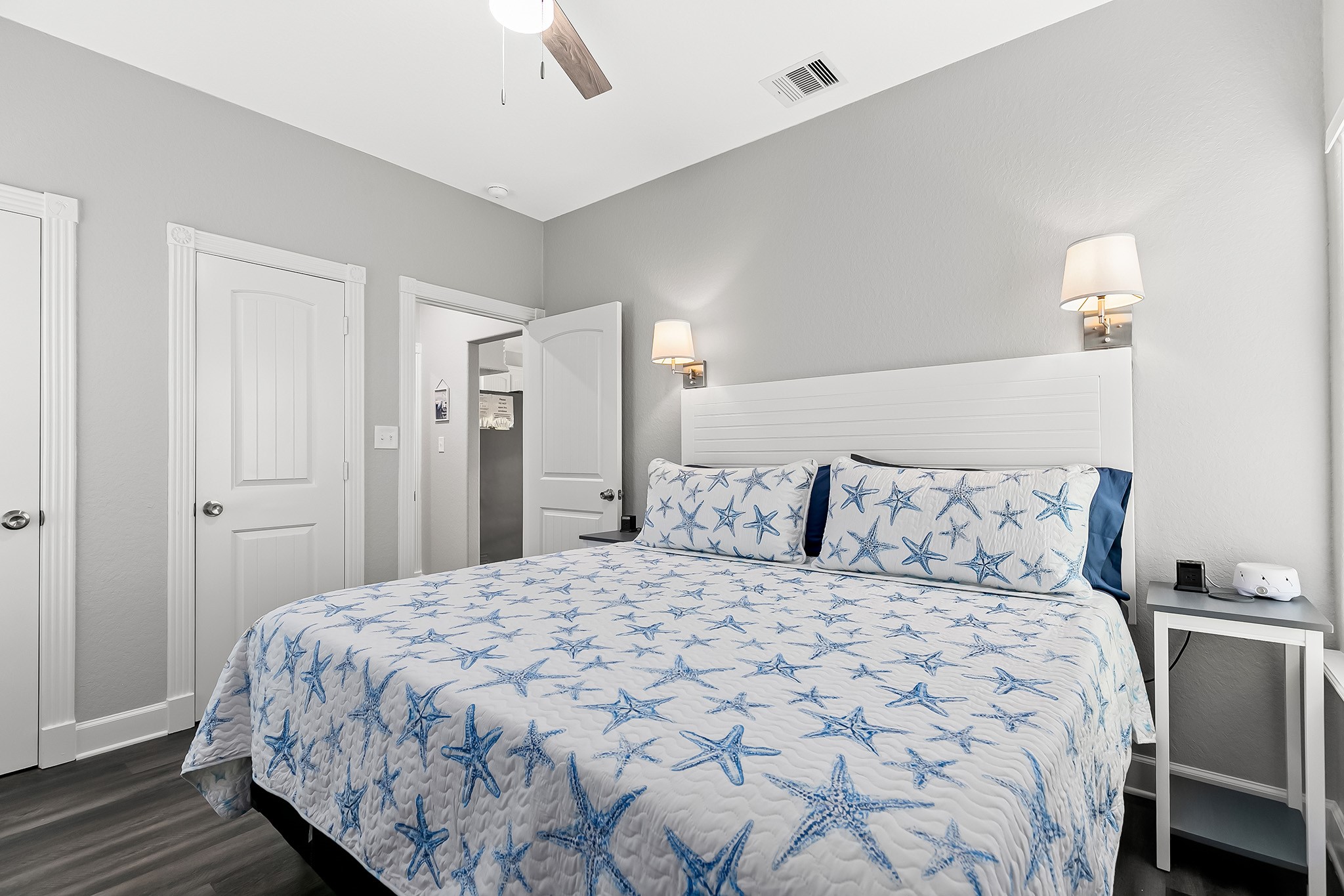 106 Pelican Place Surfside Beach, TX 77541 - Photo 18 of 46 a large bed sitting in a bedroom and a table