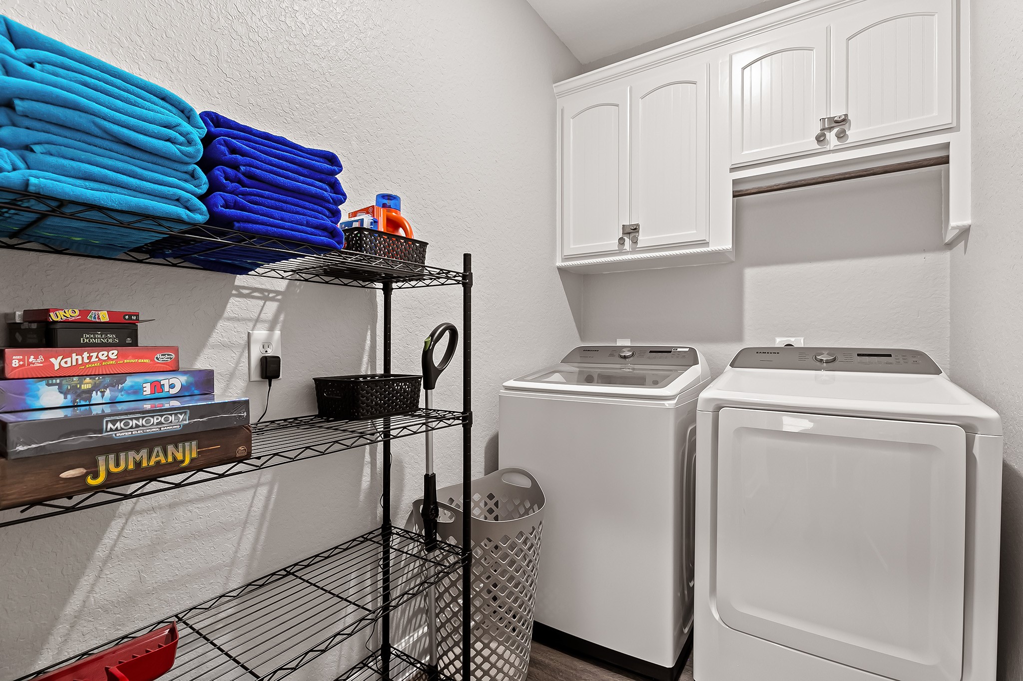 106 Pelican Place Surfside Beach, TX 77541 - Photo 20 of 46 a kitchen with stainless steel appliances granite countertop a stove and a refrigerator