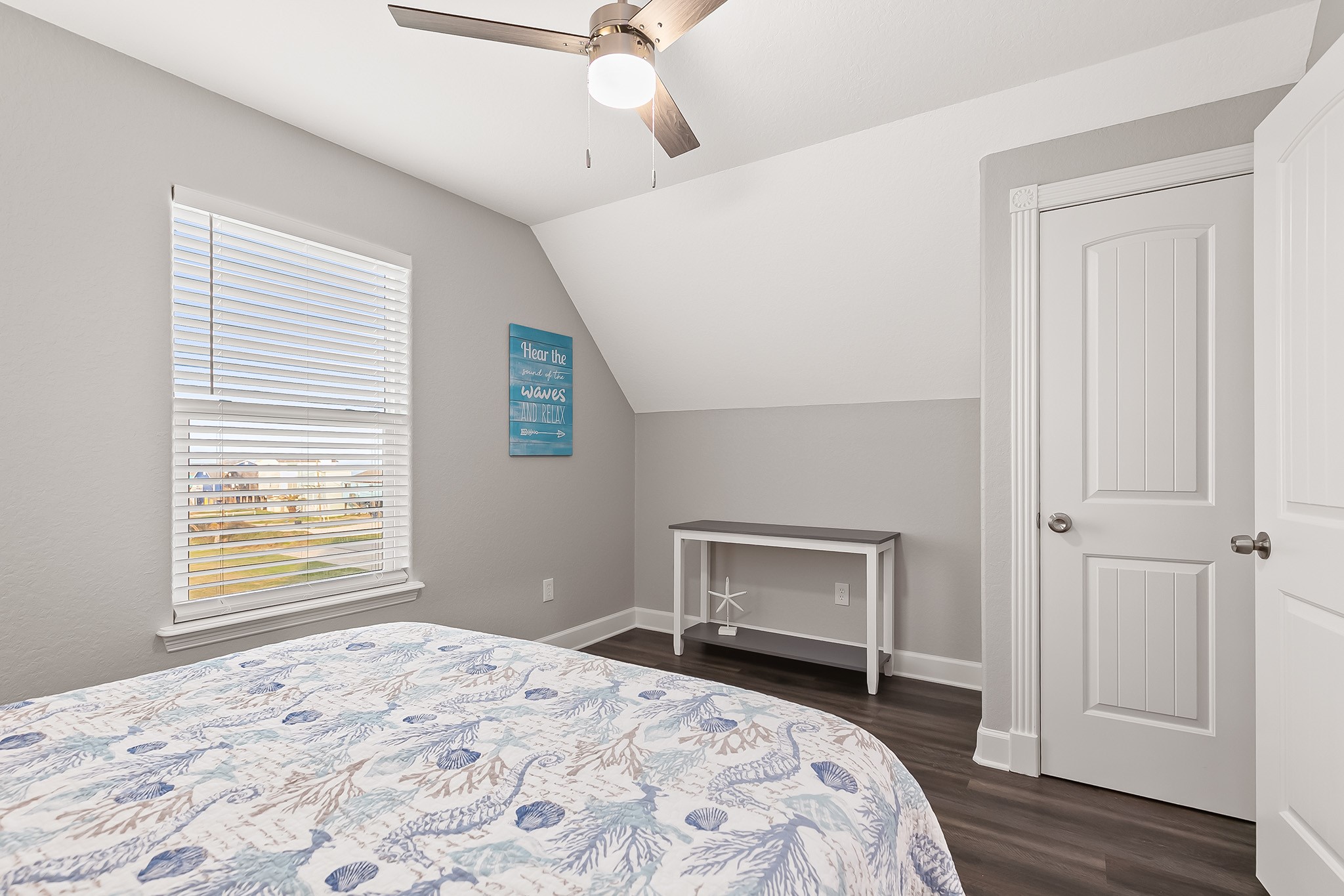 106 Pelican Place Surfside Beach, TX 77541 - Photo 22 of 46 a bedroom with a bed and a fireplace