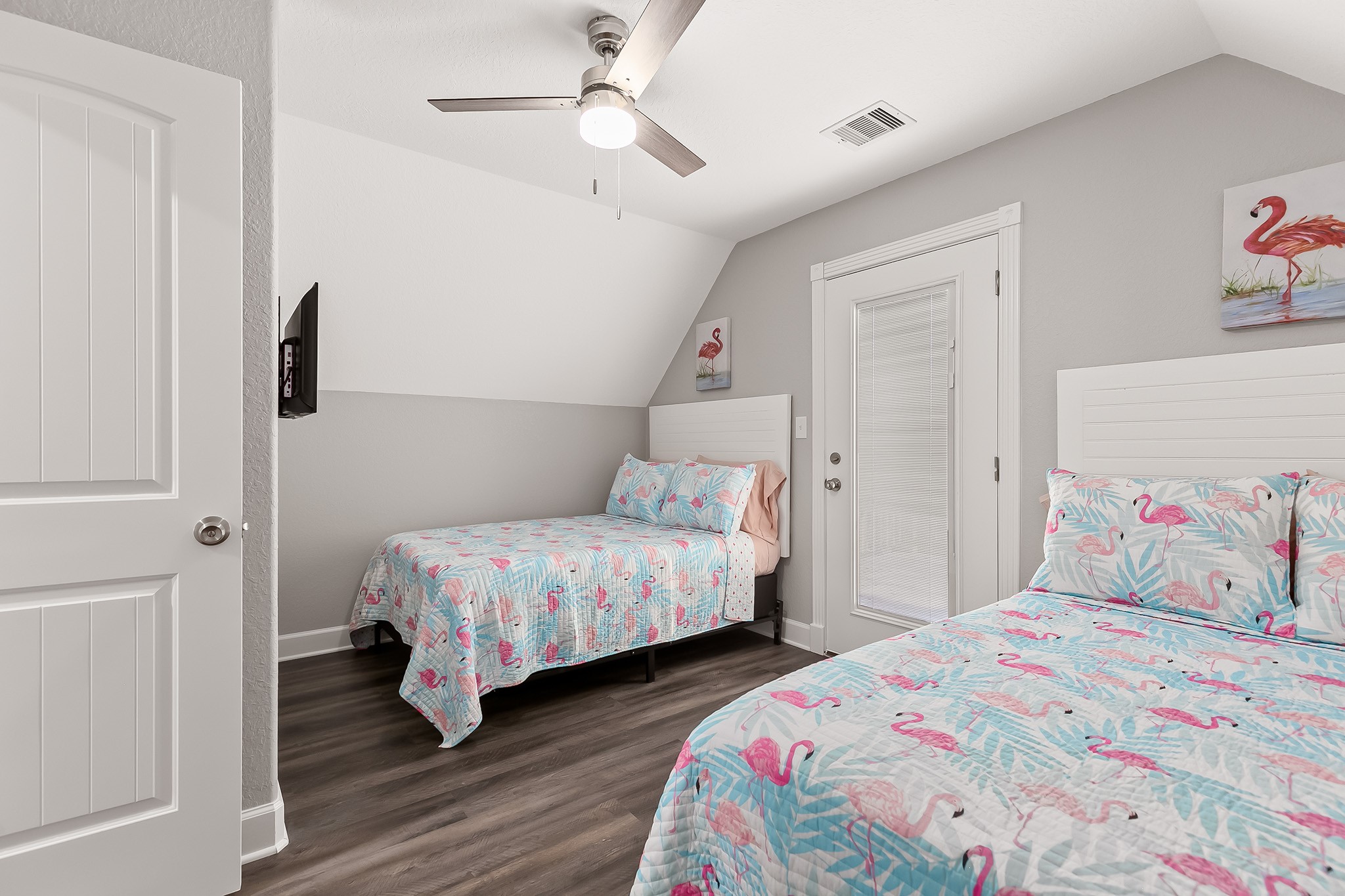 106 Pelican Place Surfside Beach, TX 77541 - Photo 24 of 46 a bedroom with bed and wooden floor