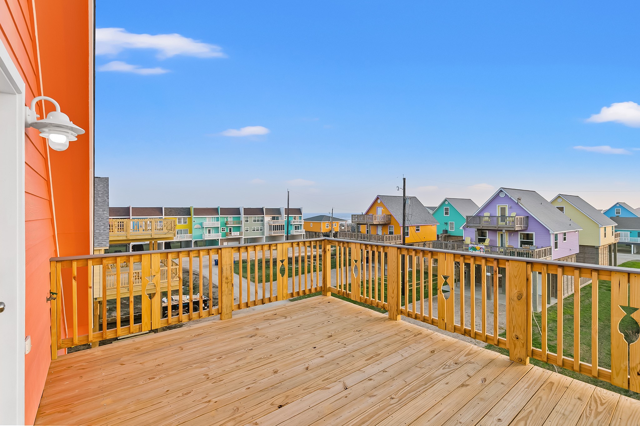 106 Pelican Place Surfside Beach, TX 77541 - Photo 31 of 46 a view of a balcony with wooden floor