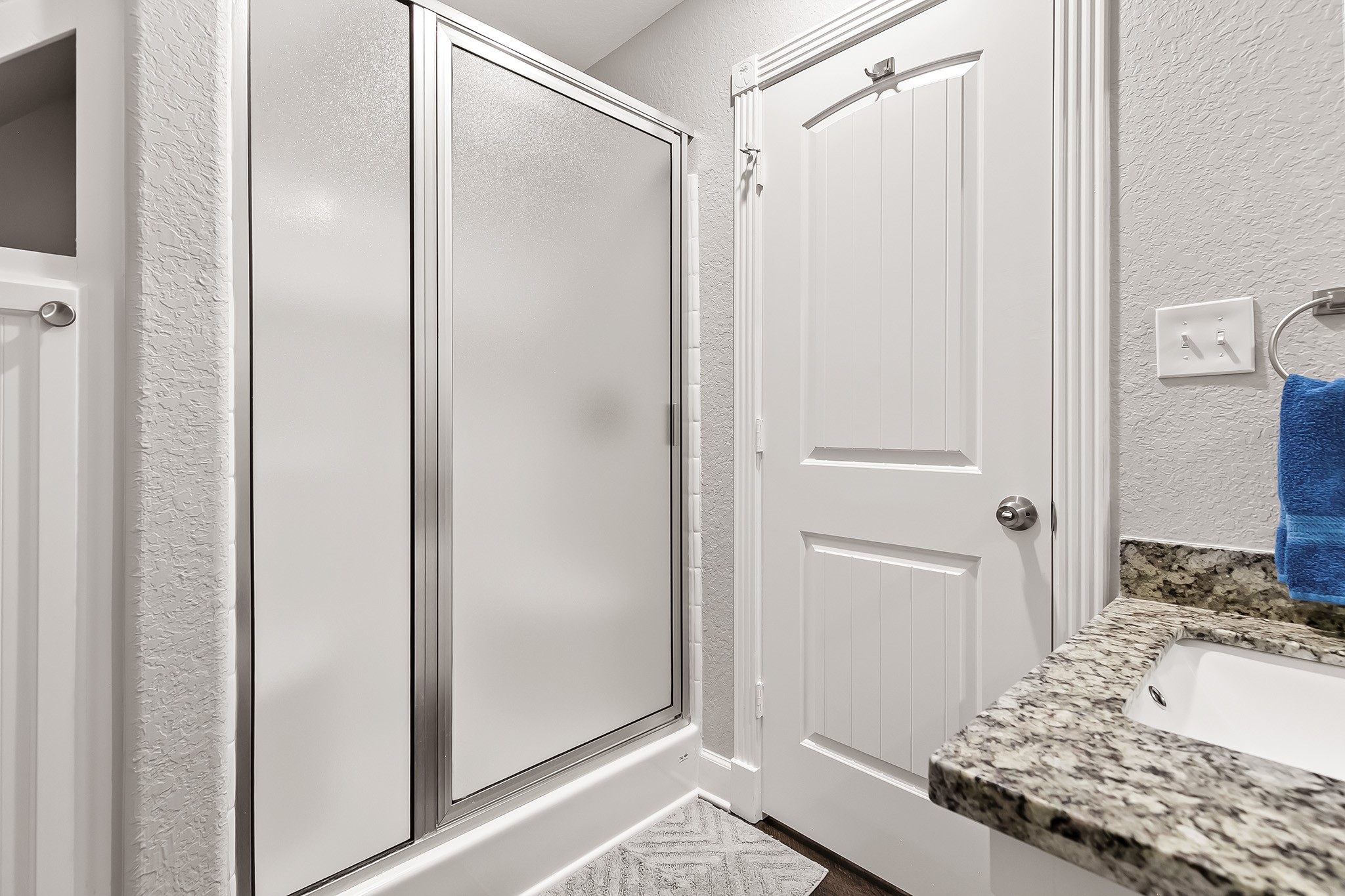 106 Pelican Place Surfside Beach, TX 77541 - Photo 33 of 46 a bathroom with a granite countertop sink and shower