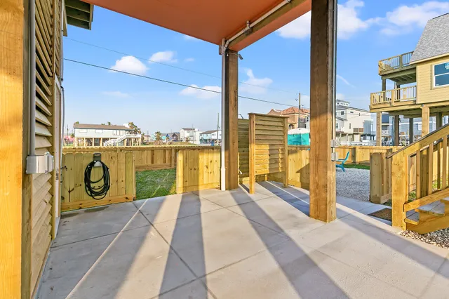 a view of a swimming pool with an outdoor seating