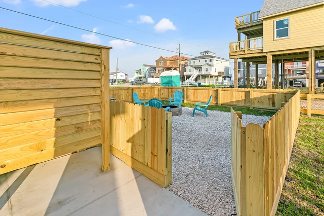 a view of swimming pool with an outdoor seating