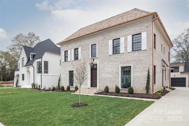 front view of house with a yard