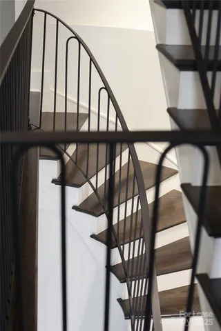 a bathroom with a sink a mirror and a shower