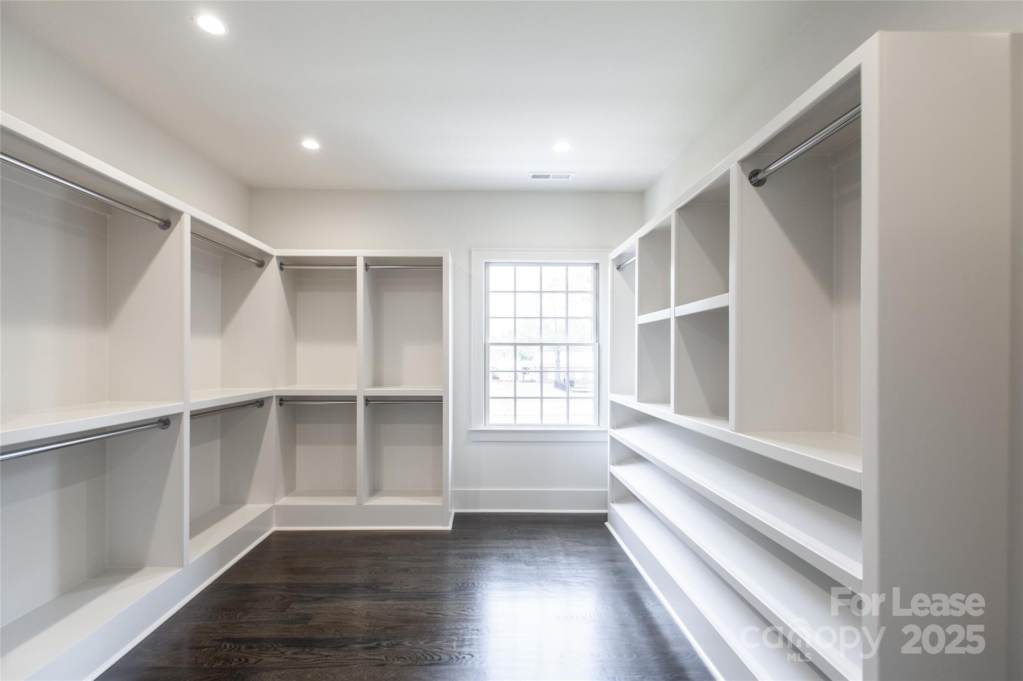 5024 Gilchrist Road Charlotte, NC 28211 - Photo 48 of 48 a view of an empty room with a window and wooden floor