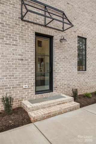 a brick house with a outdoor space