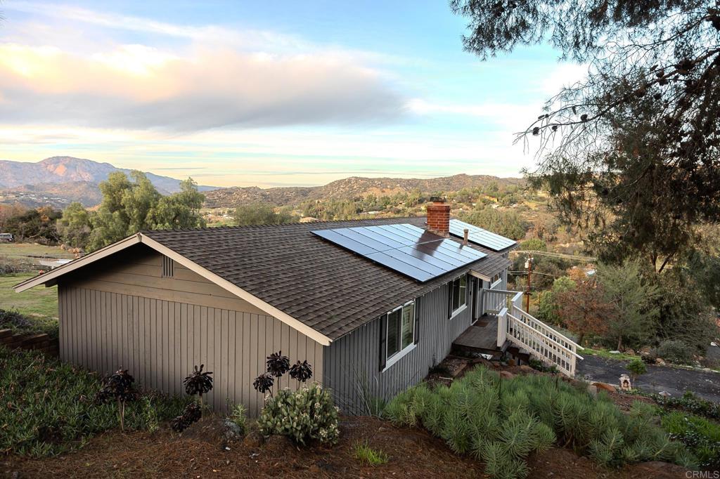 751 South Grade Road Alpine, CA 91901 - Photo 11 of 67 a view of a house with a yard and potted plants