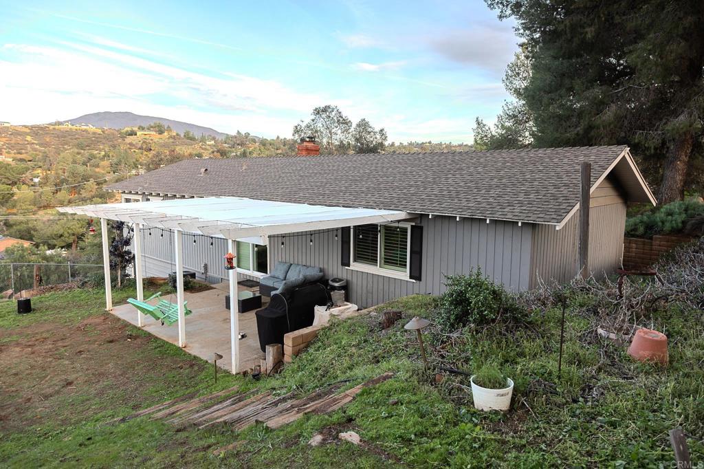 751 South Grade Road Alpine, CA 91901 - Photo 12 of 67 a view of a house with backyard and garden