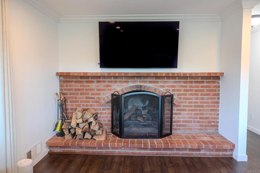 751 South Grade Road Alpine, CA 91901 - Photo 18 of 67 a living room with fireplace