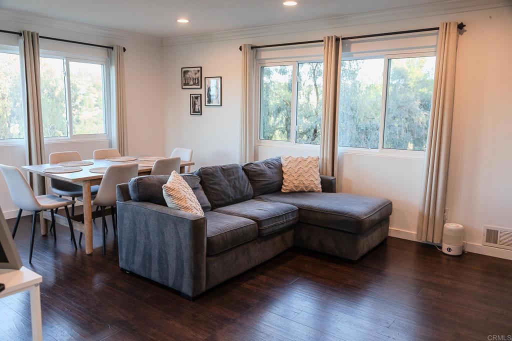 751 South Grade Road Alpine, CA 91901 - Photo 21 of 67 a living room with furniture and wooden floor