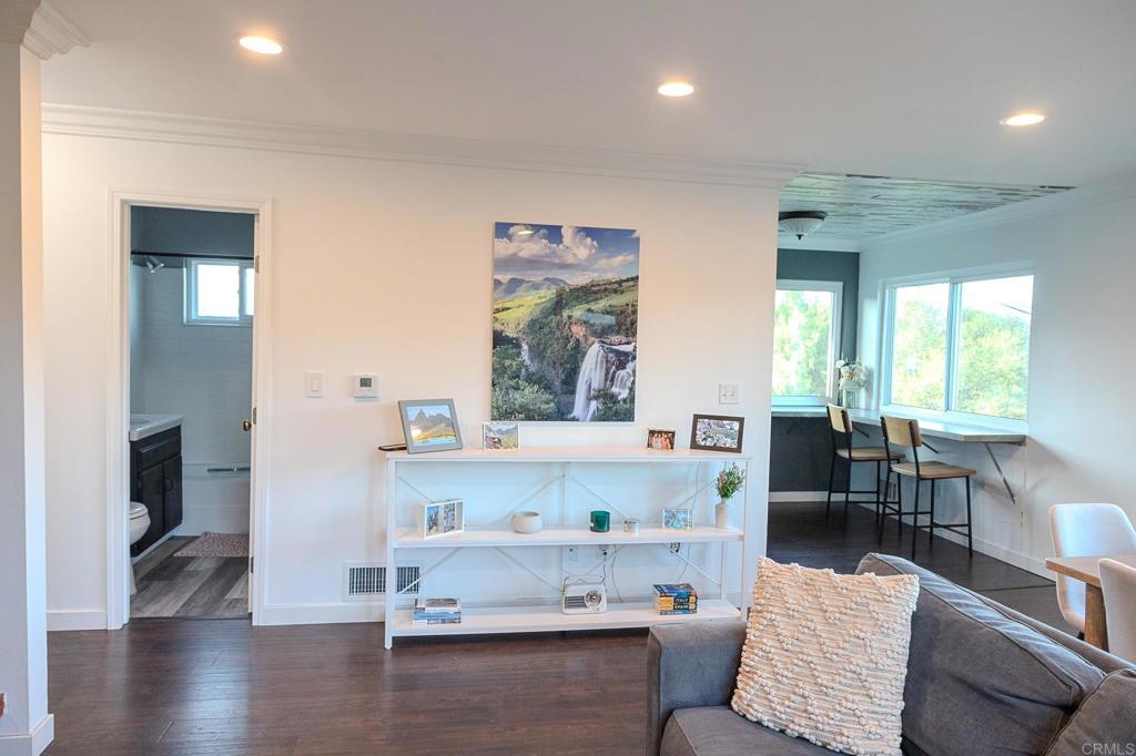 751 South Grade Road Alpine, CA 91901 - Photo 29 of 67 a living room with furniture and a large window