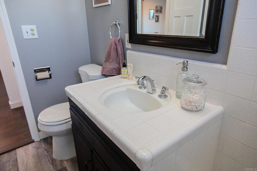 751 South Grade Road Alpine, CA 91901 - Photo 38 of 67 a bathroom with a sink and a toilet