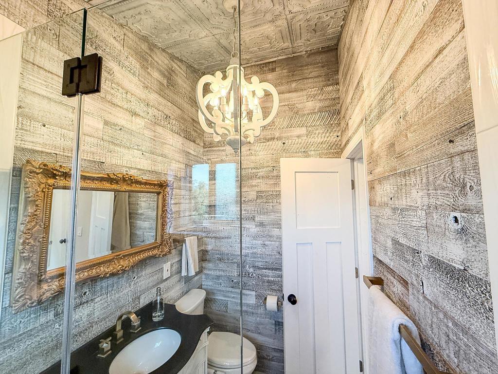 751 South Grade Road Alpine, CA 91901 - Photo 41 of 67 a bathroom with a granite countertop sink toilet a mirror and shower