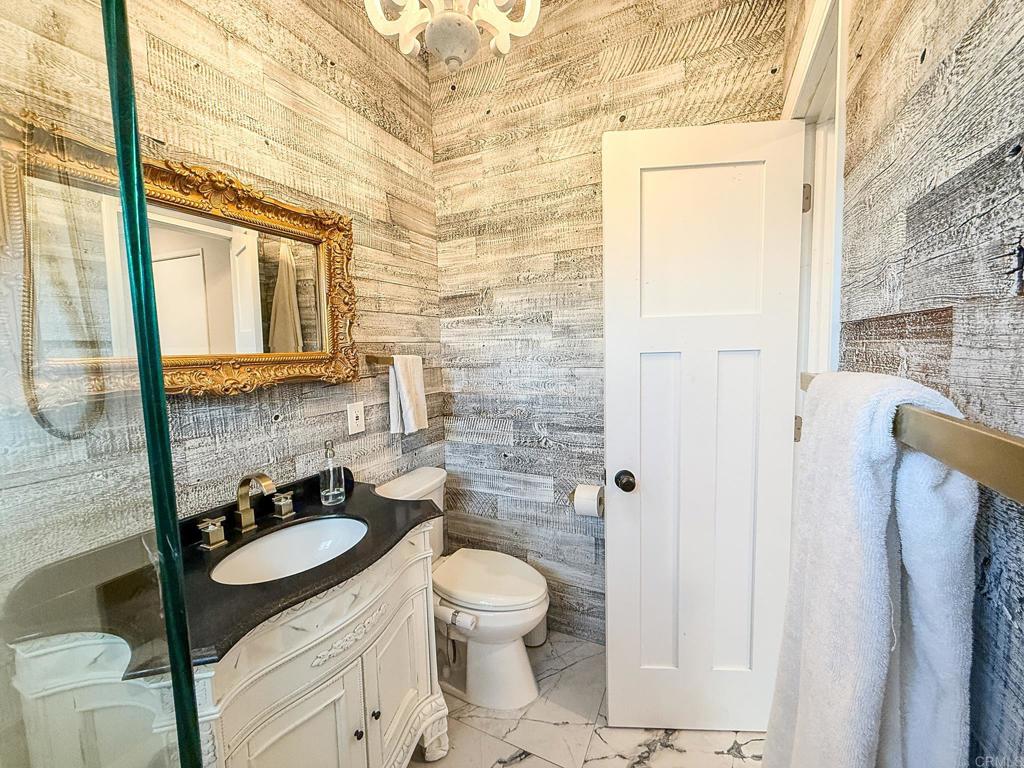 751 South Grade Road Alpine, CA 91901 - Photo 42 of 67 a bathroom with a granite countertop sink toilet and shower