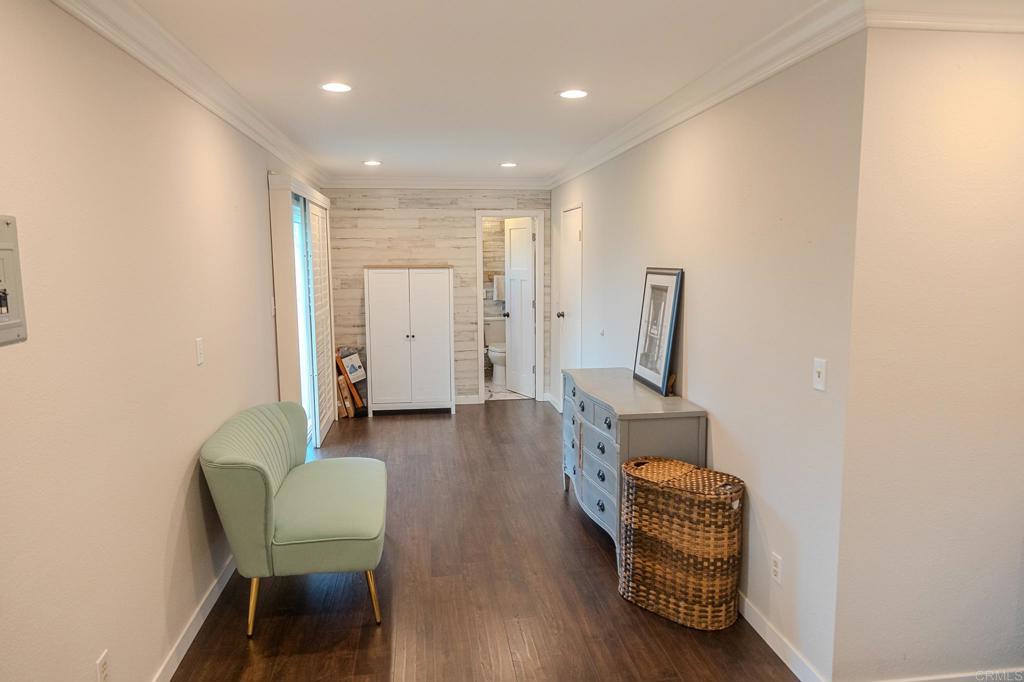 751 South Grade Road Alpine, CA 91901 - Photo 49 of 67 a living room with furniture and a wooden floor