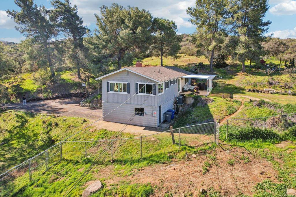 751 South Grade Road Alpine, CA 91901 - Photo 58 of 67 a view of a house with a yard