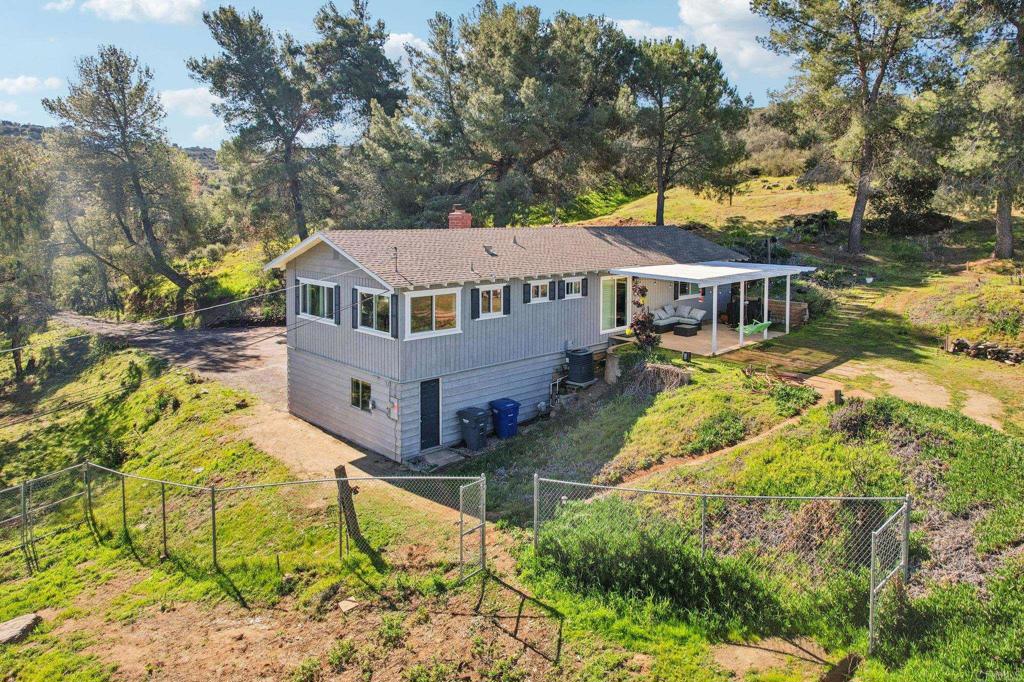 751 South Grade Road Alpine, CA 91901 - Photo 59 of 67 a aerial view of a house with a big yard and large trees