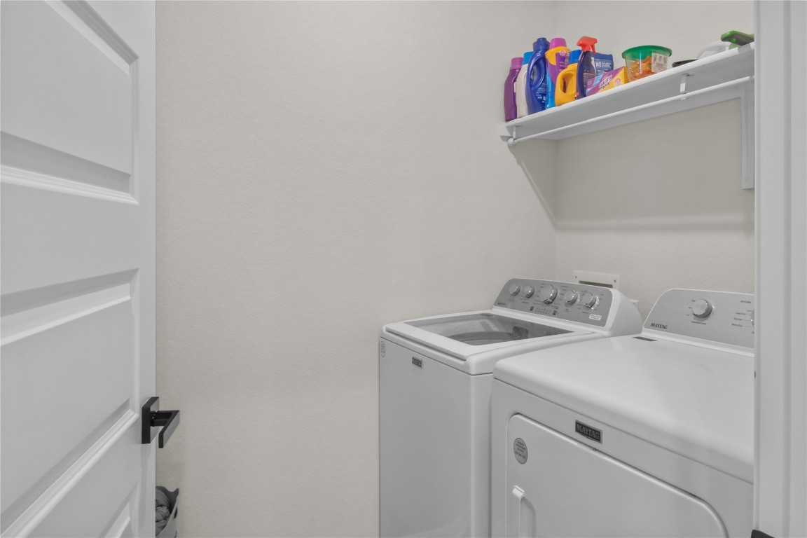 323 Tolo Drive Elgin, TX 78621 - Photo 18 of 32 Washroom with separate washer and dryer