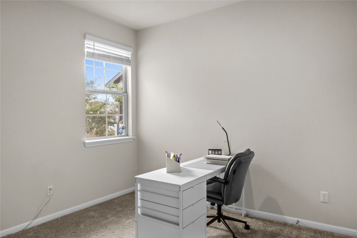 323 Tolo Drive Elgin, TX 78621 - Photo 21 of 32 3rd bedroom featuring light colored carpet