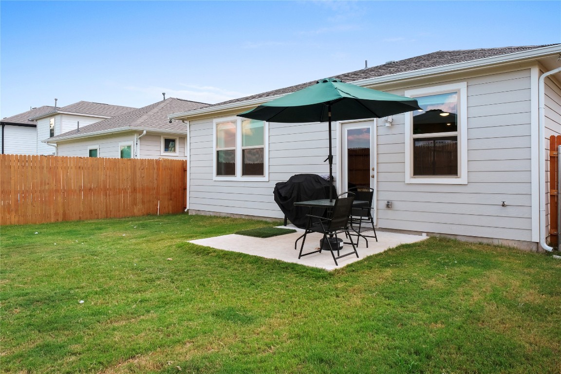 323 Tolo Drive Elgin, TX 78621 - Photo 26 of 32 Back of house featuring a patio