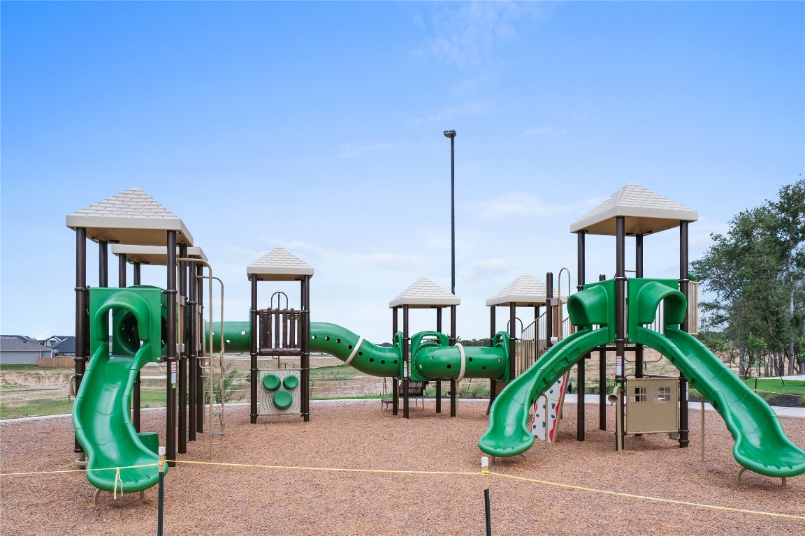 323 Tolo Drive Elgin, TX 78621 - Photo 30 of 32 View of communal playground
