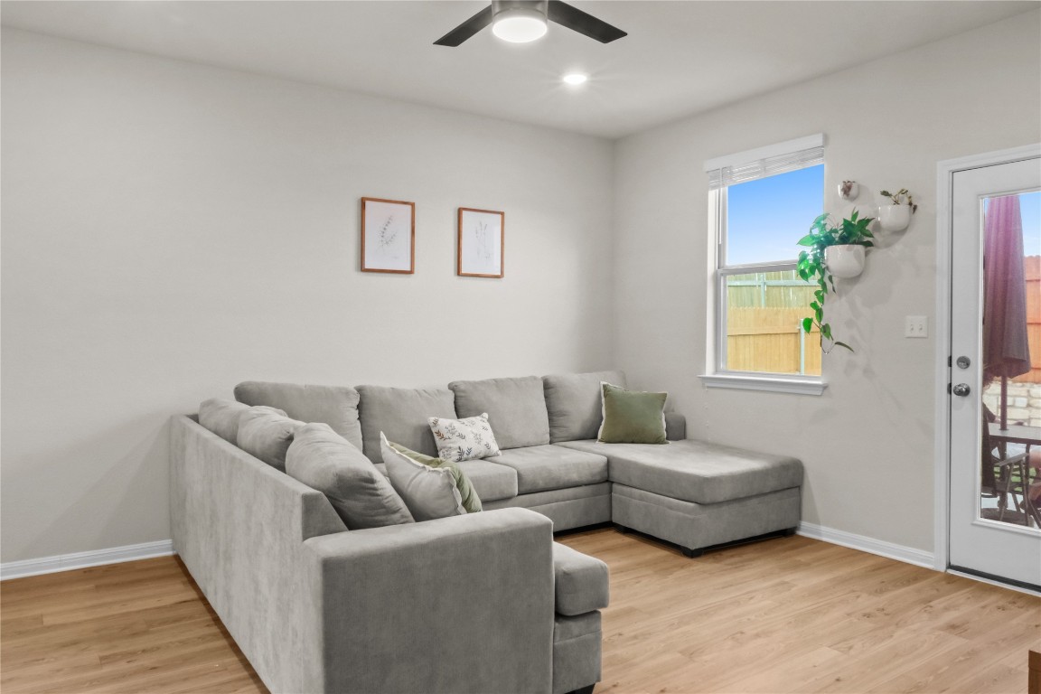 323 Tolo Drive Elgin, TX 78621 - Photo 10 of 32 Living area with light wood-type flooring, recessed lighting, and ceiling fan