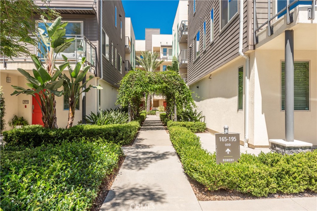 185 Bowery Irvine, CA 92612 - Photo 1 of 29 a view of a pathway both side of the house